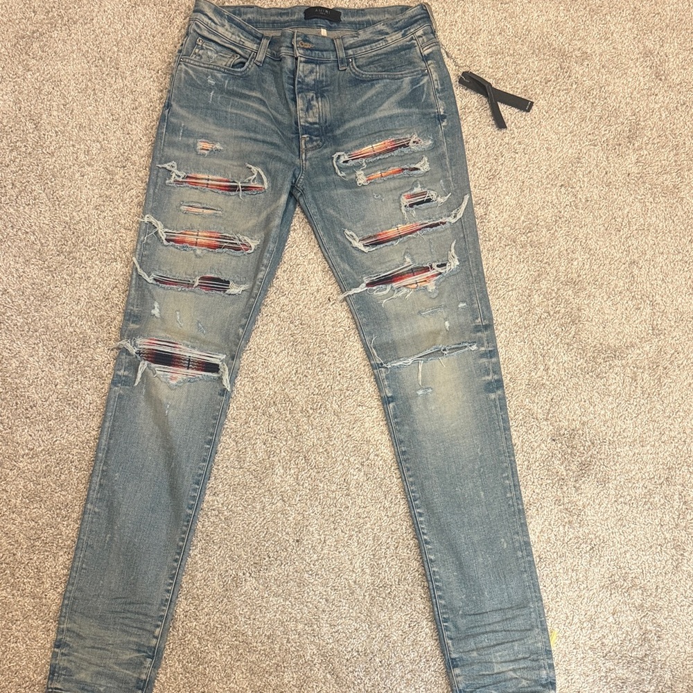 AMIRI Distressed Blue Skinny Jeans
